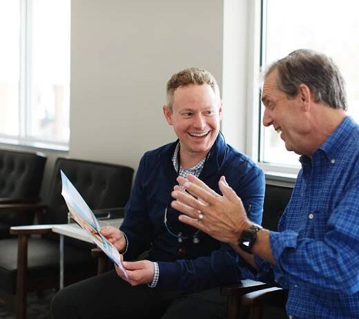 Dr. Heffernan talking with a patient