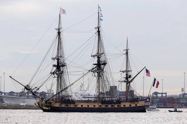 Ships sail into Baltimore's Inner Harbor.