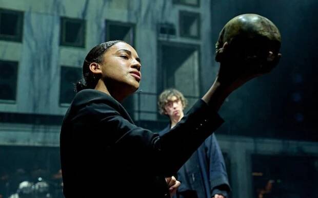 Romaya Weaver (Gravedigger) and Samuel Blenkin (Hamlet) in Hamlet Hail to the Thief