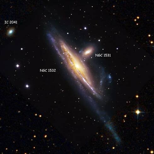 Composite of ESO and DSS images of region near spiral galaxy NGC 1532 and lenticular galaxy NGC 1531, also showing lenticular galaxy IC 2041