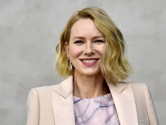 Naomi Watts shows how stripes bring life to a neutral living room – no makeover needed, just a pillow or throw