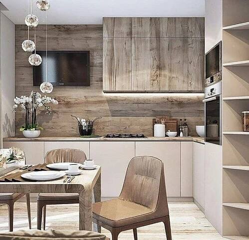 the kitchen is clean and ready to be used for dinner or lunchtime, with modern appliances