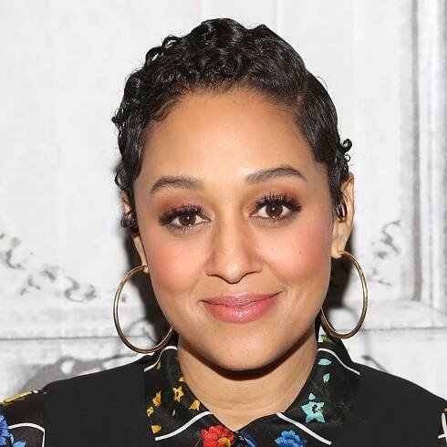 Tia Mowry Shared a Throwback Photo of Herself Wearing a Side Ponytail — See Photos