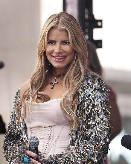 Jessica Simpson Laughs Off Wardrobe Malfunction in a Corseted Dress During Live TV Performance