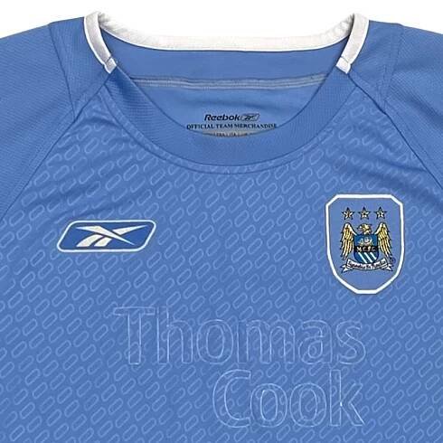 Reebok-Manchester-City-Blue-Football-Jersey. dětský modrý fotbalový vintage dres s krátkým rukávem