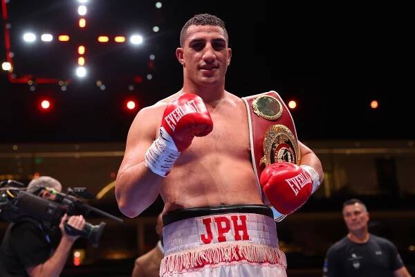 RIYADH, SAUDI ARABIA - MARCH 08: Justis Huni poses for a photo with the belt after victory against Kevin Lerena following their WBO Global Heavyweight Title fight on the Knockout Chaos boxing card at the Kingdom Arena on March 08, 2024 in Riyadh, Saudi Arabia. (Photo by Richard Pelham/Getty Images)