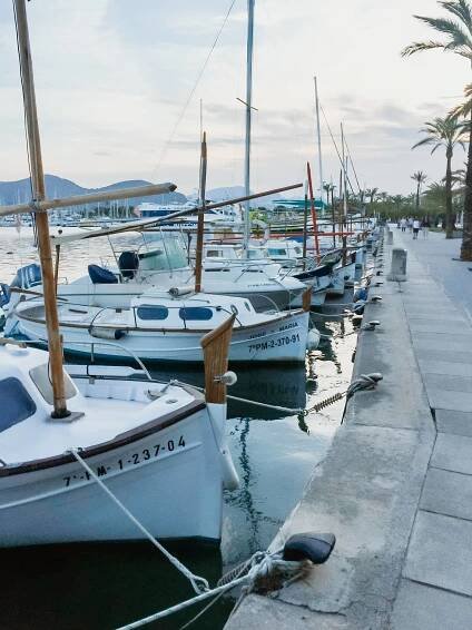 Port d'Alcudia promenade with boats