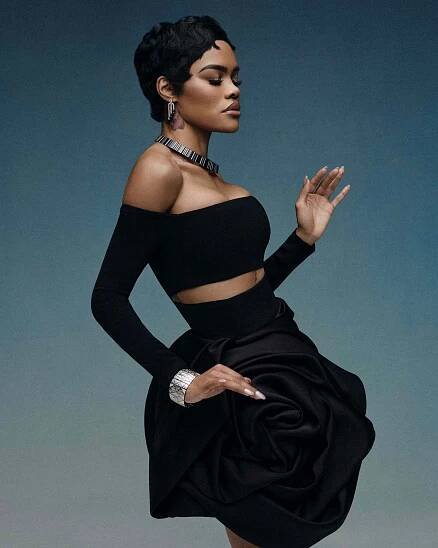 Teyana Taylor posing elegantly against a neutral background