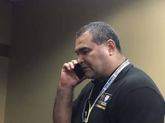 Jose Luis Chilavert Engaged in a Phone Conversation Wallpaper