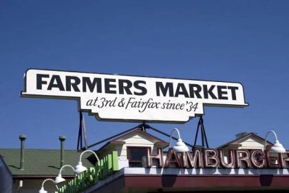 Sign for Farmers Market on Fairfax Avenue at The Grove Los Angeles shopping centre.