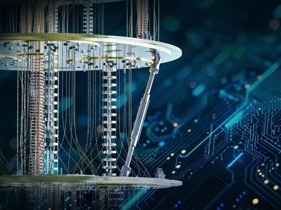 an image of a gold quantum computer over a circuitry background
