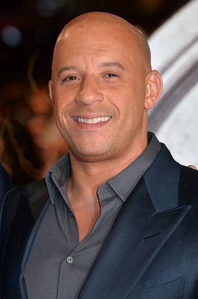 Vin Diesel with a fully-shaved haircut on the red carpet