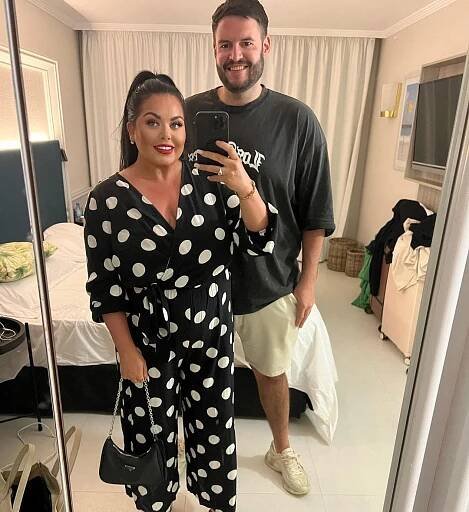 Scarlett Moffatt and a man posing for a selfie.