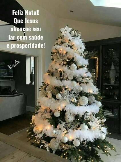 a white christmas tree in a living room