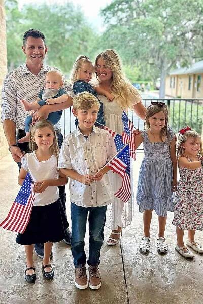 Erin Bates Paine and Chad Paine and their family