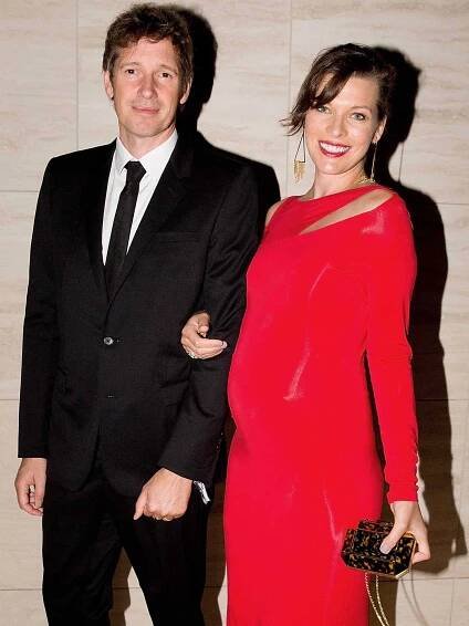 Paul W.S. Anderson and Milla Jovovich attend amfAR LA Inspiration Gala honoring Tom Ford on October 29, 2014 in Hollywood, California.