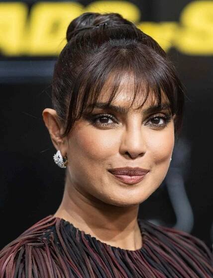 Priyanka Chopra wears a Burberry fringe dress on July 1, 2025.
