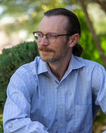 Headshot of Adam Smith