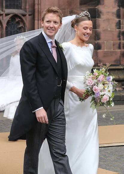 The newly married Duke and Duchess of Westminster depart Chester Cathedral after their wedding