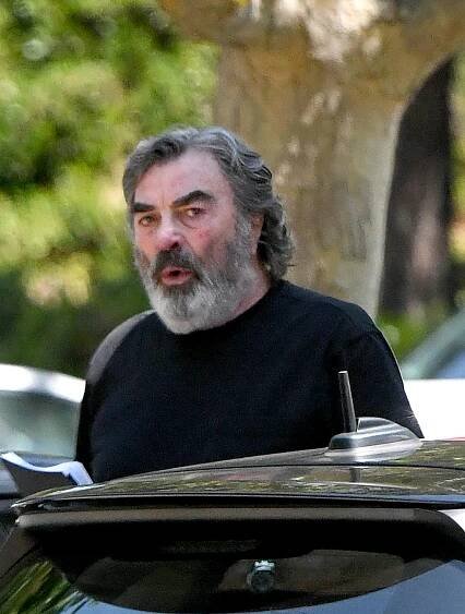 Tom Selleck leaving a gym.