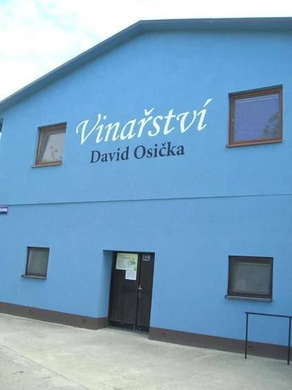 a blue building with a sign on the side of it at VINAŘSTVÍ DAVID OSIČKA in Velké Bílovice +10 photos