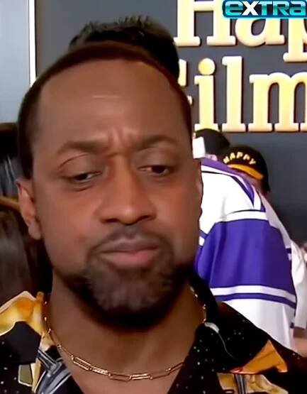 Jaleel White in a patterned shirt at a film premiere event background