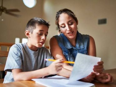 Obraz mother helping son with homework