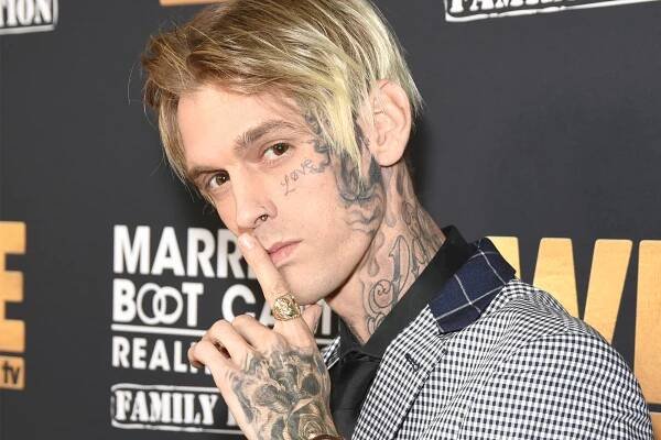 Aaron Carter's memoir release date has been pushed back amid controversy from his friends and family.