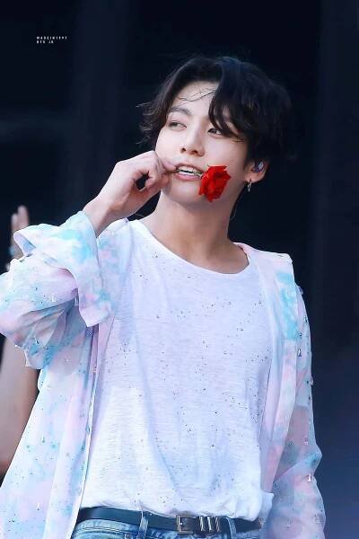 BTS's Jungkook embracing his long black hair Wallpaper