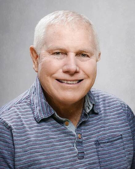 Biography — Dr John Elliott