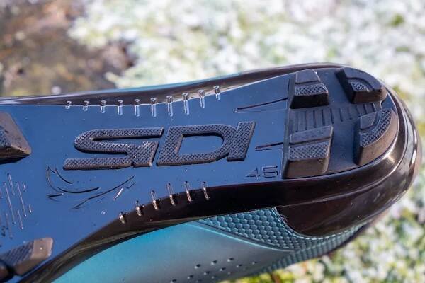 Sidi Dust MTB shoes on a wooden stump