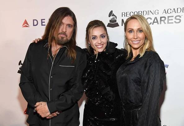 Billy Ray Cyrus, Miley Cyrus, and Tish Cyrus attend MusiCares Person of the Year honoring Dolly Parton at Los Angeles Convention Center on February 8, 2019 in Los Angeles, California.