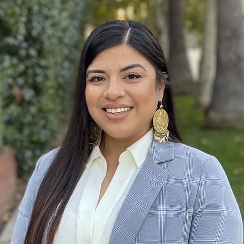 Michelle Gonzalez Portrait with trees in the back