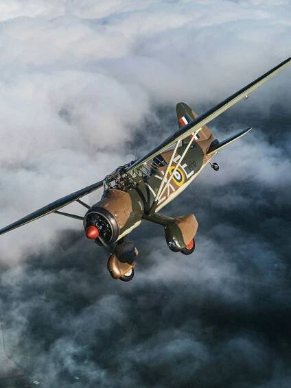 AircraftRestorationCo_Westland-Lysander-Flight-above-clouds_by-GeorgeLewisRomain.jpg
