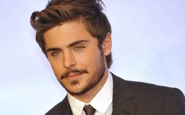 Zac Efron looks dapper with a mustache Wallpaper