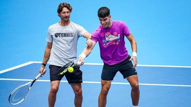 Coach Juan Carlos Ferrero and Carlos Alcaraz prepare ahead of Beijing.