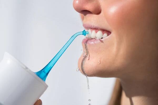 Waterpik vs. Flossing