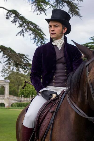 Image may contain Animal Mammal Horse Human Equestrian Person Clothing Apparel Hat Vehicle and Transportation