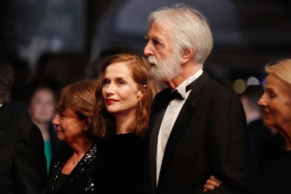 CANNES, FRANCE - MAY 22:  Isabelle Huppert, director Michael Haneke and wife Susi Haneke attend the "Happy End" screening during the 70th annual Cannes Film Festival at Palais des Festivals on May 22, 2017 in Cannes, France.  (Photo by Tristan Fewings/Getty Images)