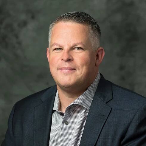 Headshot of Brian James, founder and President of NTI