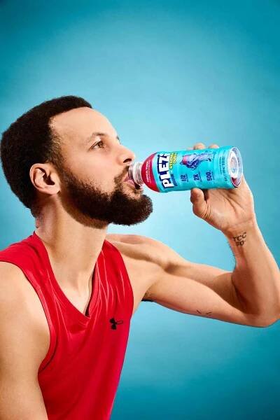 Image of Stephen Curry drinking power drink.