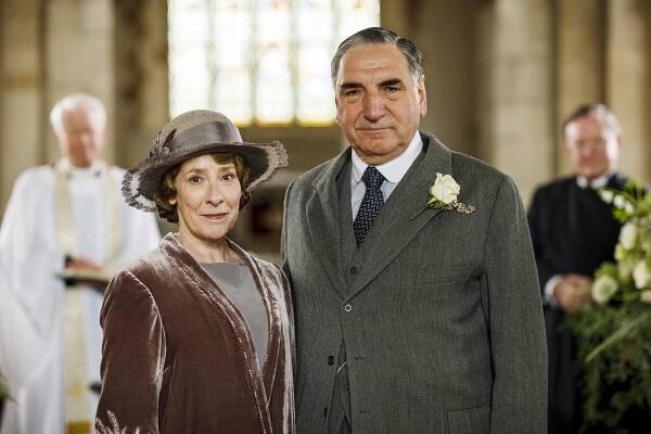 Phyllis Logan (as Mrs Hughes): Velvet wedding coat and dress, worn for the marriage of Mrs Hughes to Mr Carson Season 6, Episode 3 8 image 6 - © Carnival Film & Television Limited