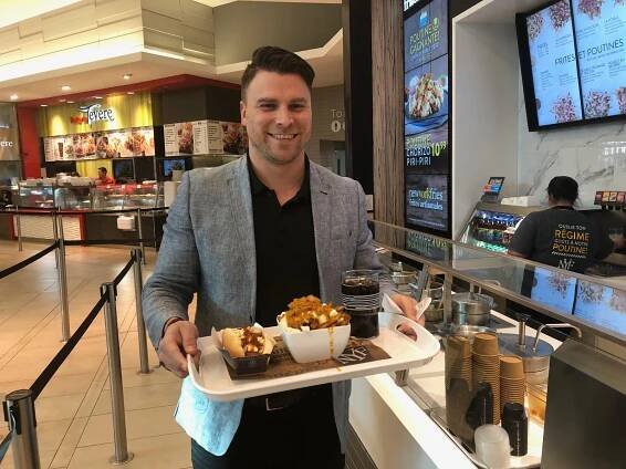 Mike Cohen stops by new Carrefour Laval food court sensation New York Fries