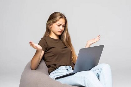 Depressed Frustrated Woman Working With Computer Laptop Desperate Work Isolated White Wall Depression