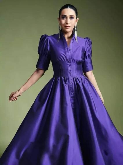 Karisma Kapoor ups the style quotient in a shiny purple shirt dress