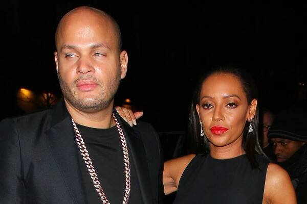LONDON, UNITED KINGDOM - DECEMBER 03: Stephen Belafonte and Melanie Brown attending the Cosmopolitan Ultimate Women Of The Year Awards on December 3, 2014 in London, England. (Photo by Mark Robert Milan/GC Images)