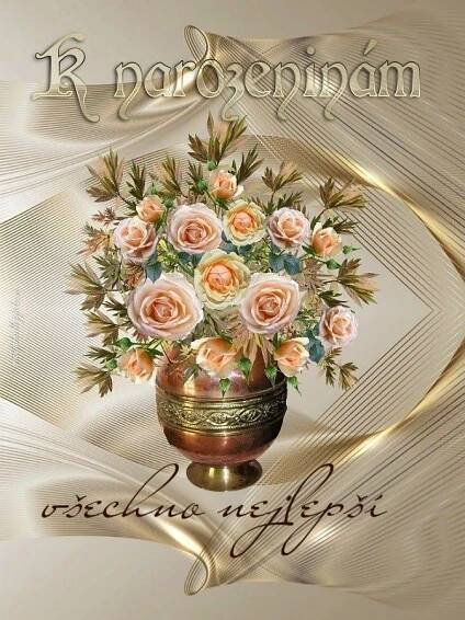 a vase filled with lots of flowers on top of a table