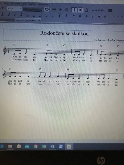 a computer screen with music notes on it's keyboard and the words rozonovu se skolukuu