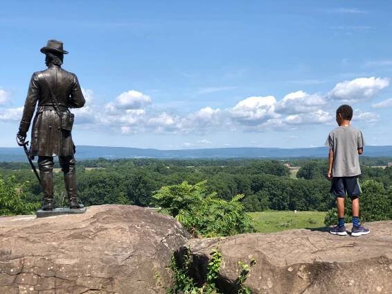 Back of a statue overlooking a vista at Gettysburg National Military Park.