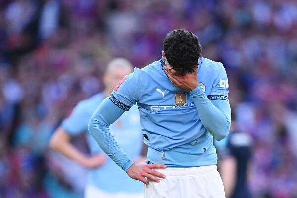 Josko Gvardiol of Manchester City dejected after FA Cup Final loss.